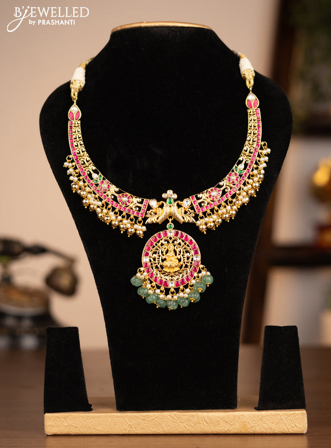 Antique necklace lakshmi pendant with jadau kundan stones and pearl & pumpkin beads hanging without earrings
