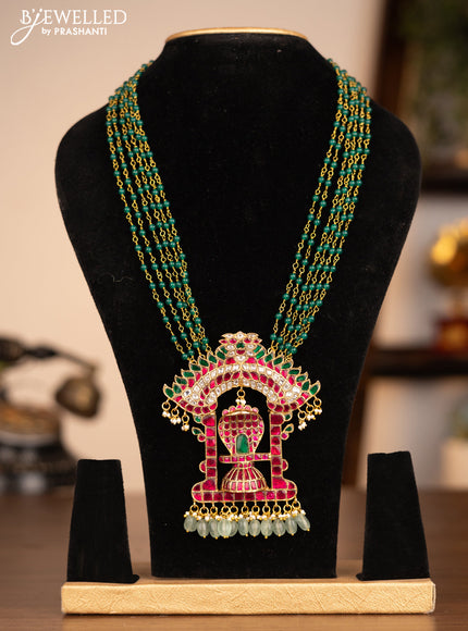 Antique beaded green necklace shiv lingam pendant with jadau kundan stones and pearl & beads hanging without earrings