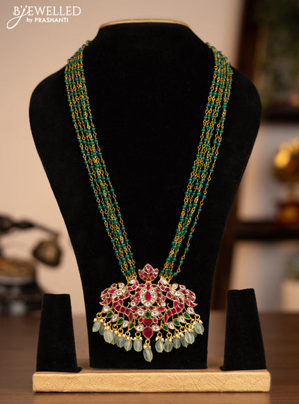Antique beaded green necklace double peacock pendant with jadau kundan stones and pearl & beads hanging without earrings