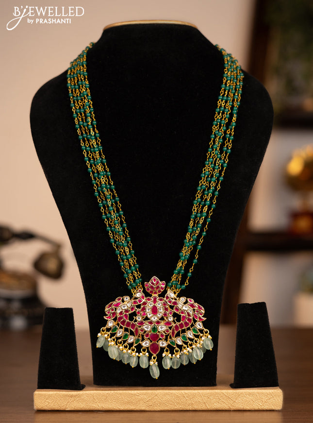 Antique beaded green necklace double peacock pendant with jadau kundan stones and pearl & beads hanging without earrings