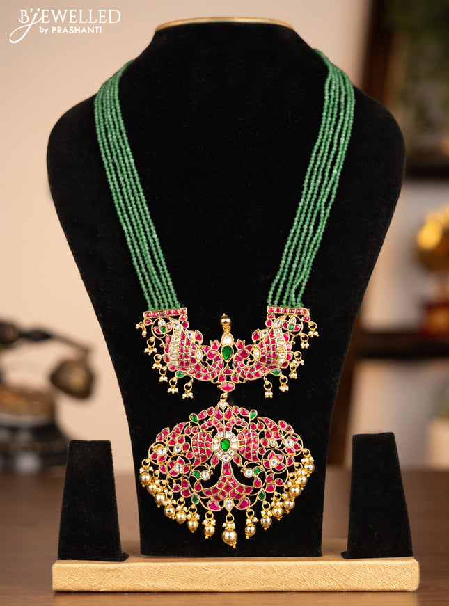 Antique beaded green necklace peacock design with jadau kundan stones and pearl & golden beads hanging without earrings