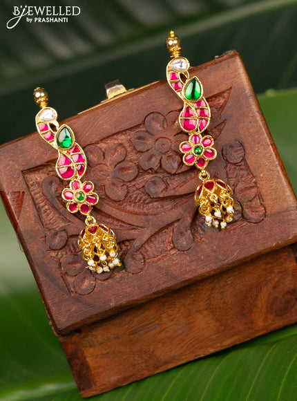 Antique screw type jhumka with jadau kundan stones and pearl hangings