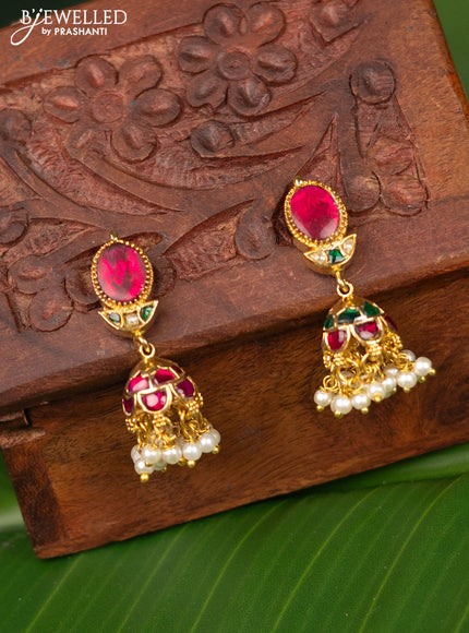 Antique screw type jhumka with jadau kundan stones and pearl hangings
