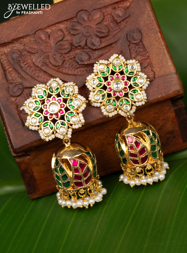 Antique screw type jhumka floral design with jadau kundan stones and pearl hangings