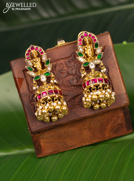 Antique screw type jhumka krishna design with jadau kundan stones and pearl & golden beads hanging