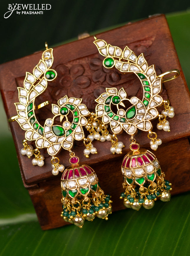 Antique earcuff jhumka peacock design with jadau kundan stones and pearl hangings