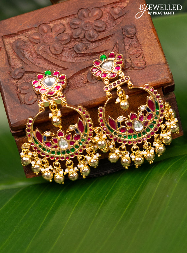 Antique screw type earrings with jadau kundan stones and pearl & golden beads hanging