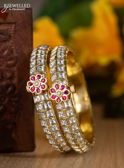 Jadau screw type bangles with pink jadau and kundan stones