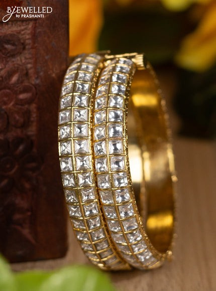Jadau screw type bangles with kundan stones