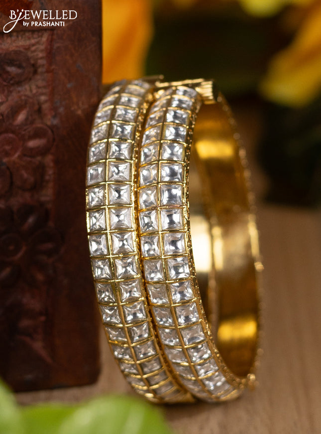 Jadau screw type bangles with kundan stones