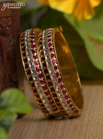 Jadau screw type bangles with pink jadau and kundan stones