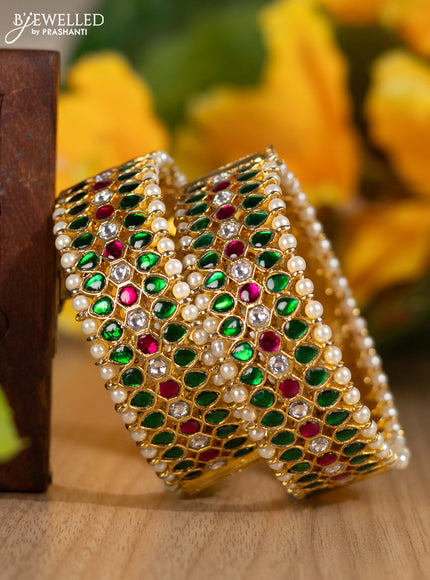 Jadau screw type bangles with jadau kemp & kundan stones and pearls