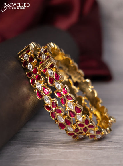 Antique screw type bangle with pink jadau kundan stones