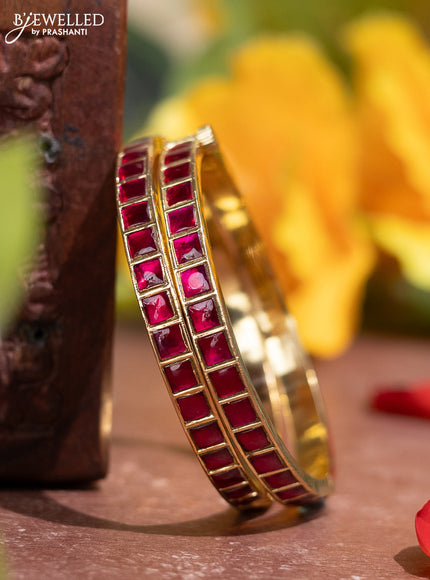 Jadau screw type bangle with pink jadau kundan stones