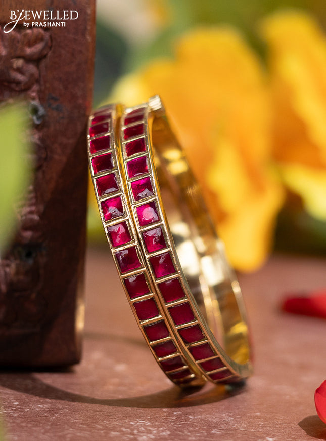 Jadau screw type bangle with pink jadau kundan stones