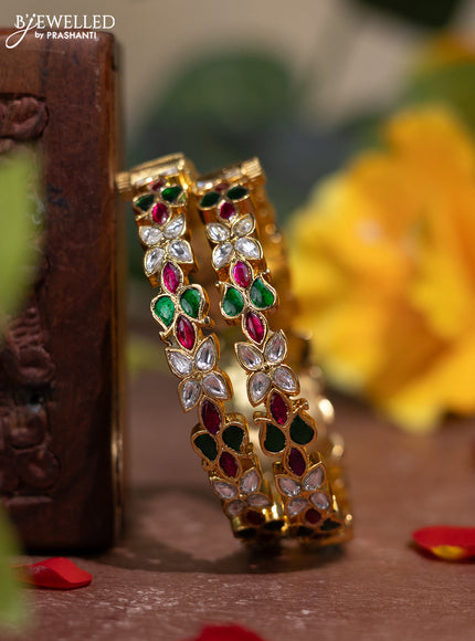 Jadau screw type bangle with floral design and jadau & kundan stones
