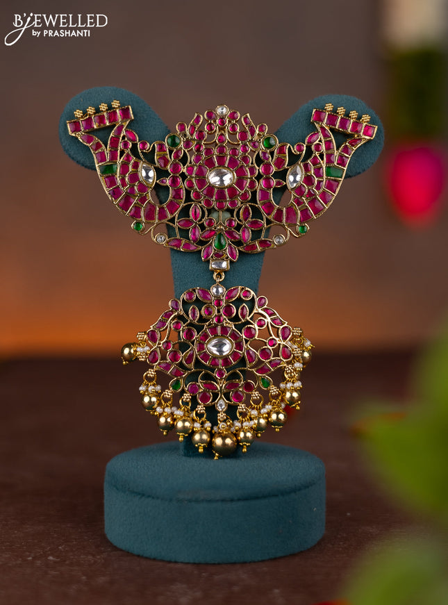 Jadau pendant peacock design with jadau kundan stones and pearl & golden beads hanging