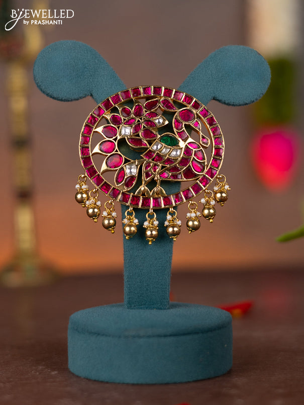 Jadau pendant peacock design with jadau kundan stones and pearl & golden beads hanging