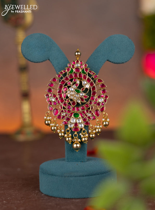 Jadau pendant peacock design with jadau kundan stones and pearl & golden beads hanging