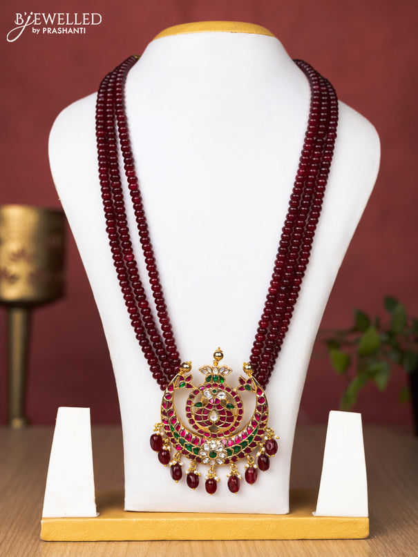 Jadau beaded maroon haaram chandbali pendant with jadau kundan stones and pearl & beads hanging without earrings