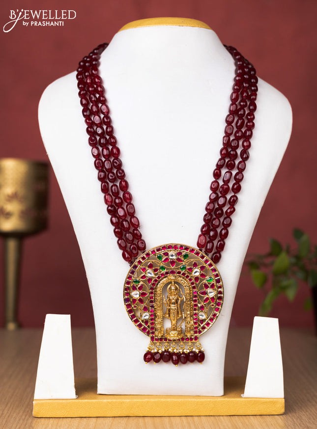 Jadau beaded maroon haaram ramlala pendant with jadau kundan stones and pearl & beads hanging without earrings
