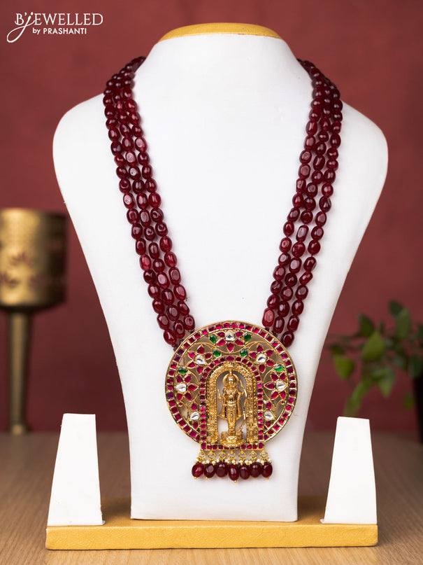 Jadau beaded maroon haaram ramlala pendant with jadau kundan stones and pearl & beads hanging without earrings