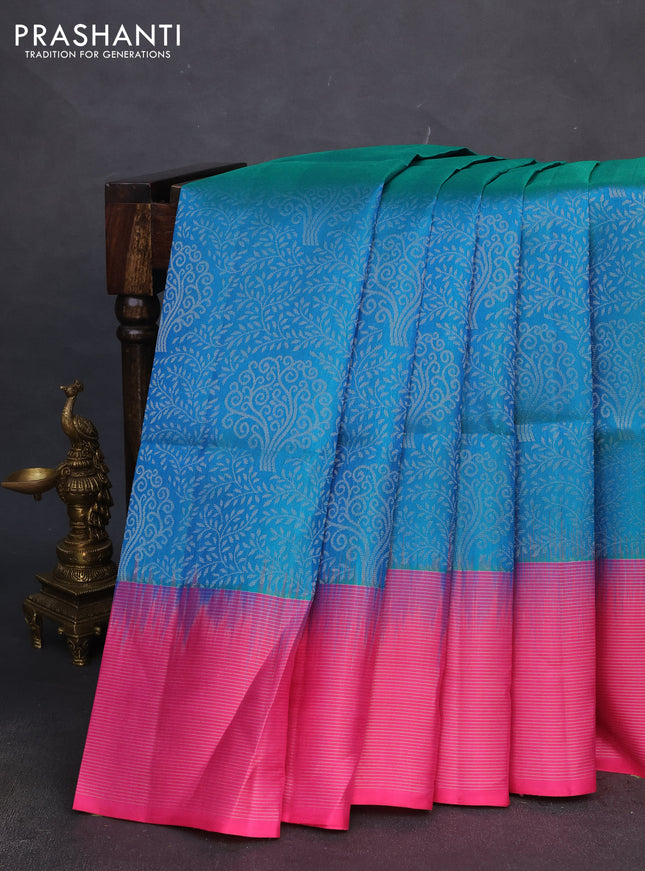 Pure soft silk saree dual shade of cs blue and pink with allover silver zari brocade weaves and zari woven border