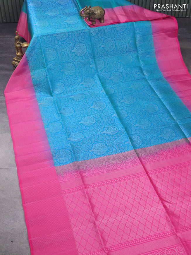 Pure soft silk saree dual shade of cs blue and pink with allover silver zari brocade weaves and zari woven border