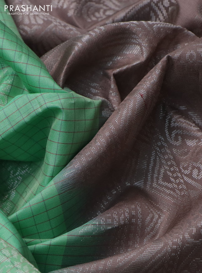 Pure soft silk saree teal green shade and pastel brown with allover checks & silver zari woven buttas and simple border