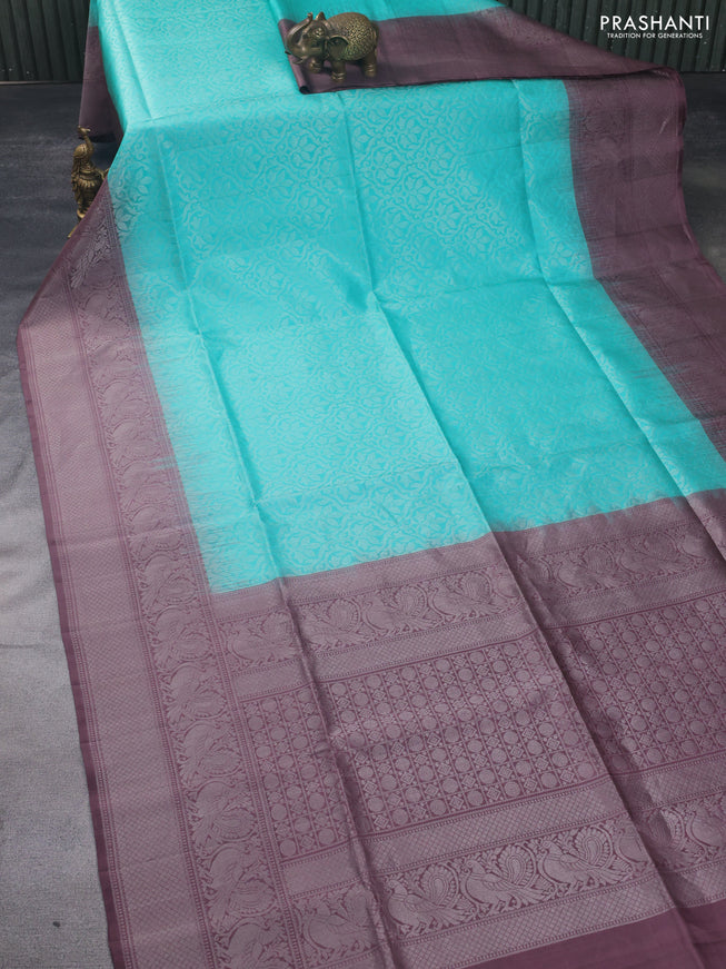 Pure soft silk saree teal shade and rosy brown with silver zari woven brocade weaves and silver zari woven annam border