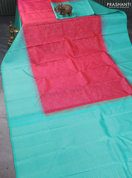 Pure soft silk saree dual shade of pinkish orange and teal shade with allover silver zari weaves and long silver zari woven border