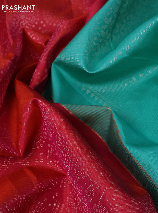 Pure soft silk saree dual shade of pinkish orange and teal shade with allover silver zari weaves and long silver zari woven border