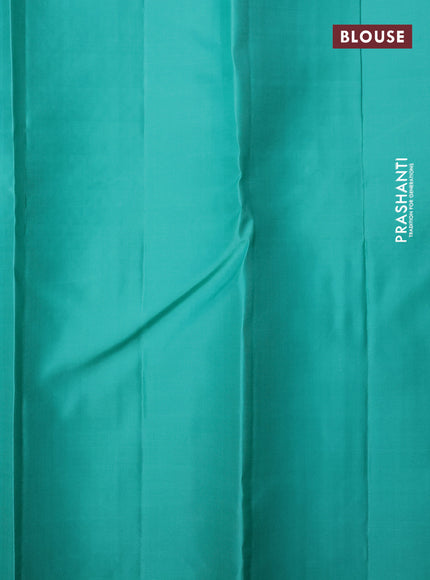 Pure soft silk saree dual shade of pinkish orange and teal shade with allover silver zari weaves and long silver zari woven border