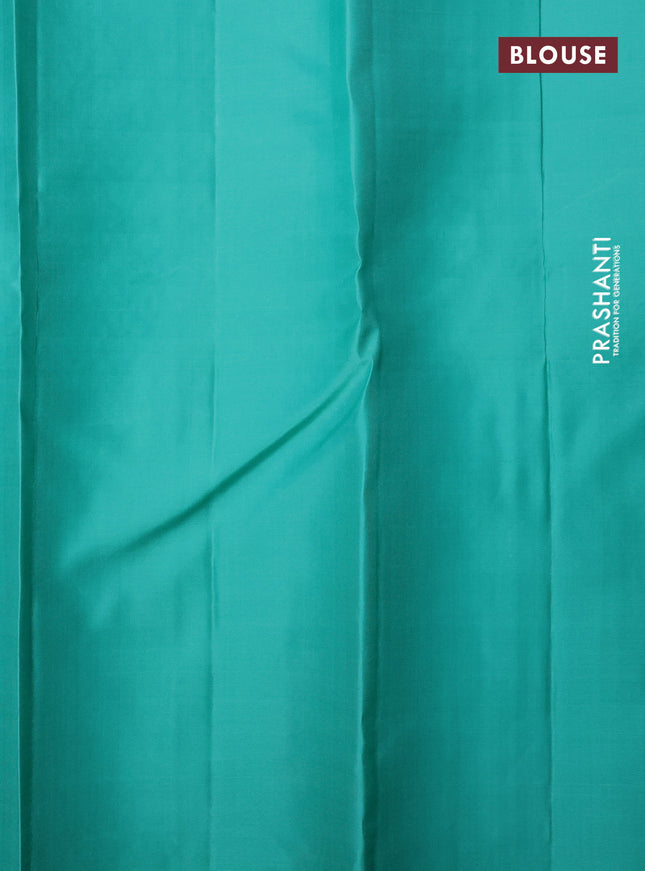 Pure soft silk saree dual shade of pinkish orange and teal shade with allover silver zari weaves and long silver zari woven border