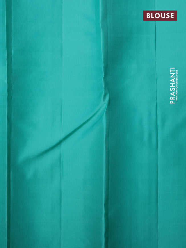 Pure soft silk saree dual shade of pinkish orange and teal shade with allover silver zari weaves and long silver zari woven border