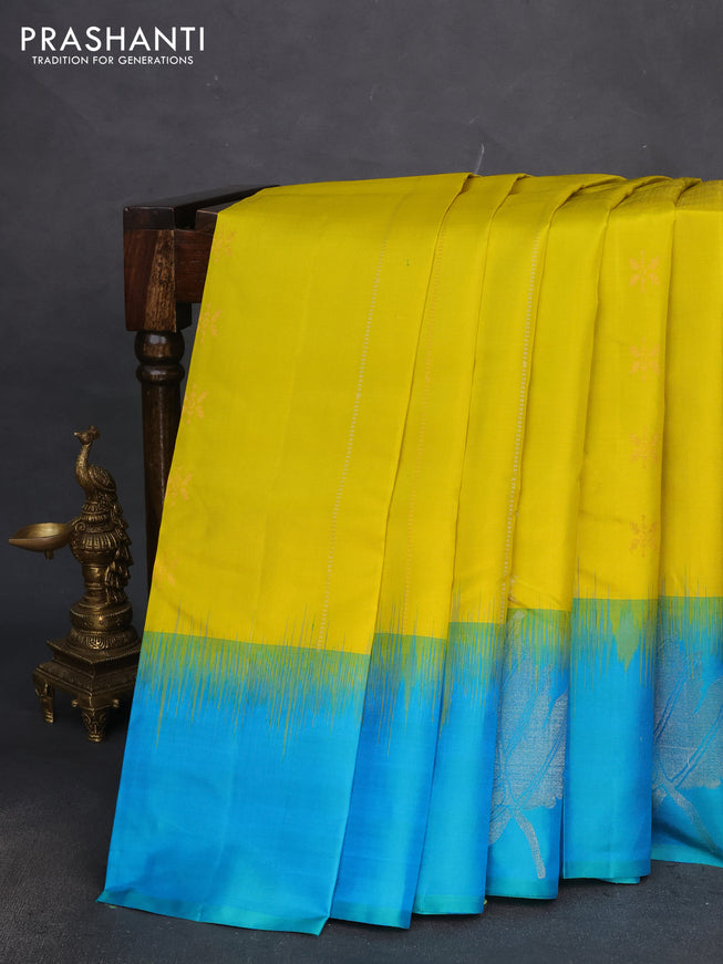 Pure soft silk saree lime yellow and dual shade of teal blue with allover zari weaves & buttas and zari woven butta border