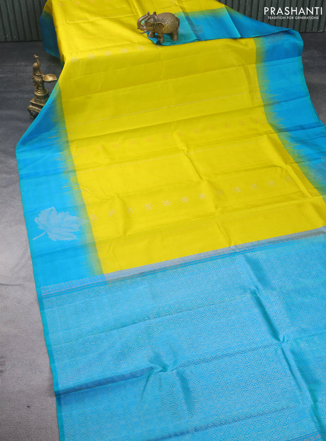 Pure soft silk saree lime yellow and dual shade of teal blue with allover zari weaves & buttas and zari woven butta border