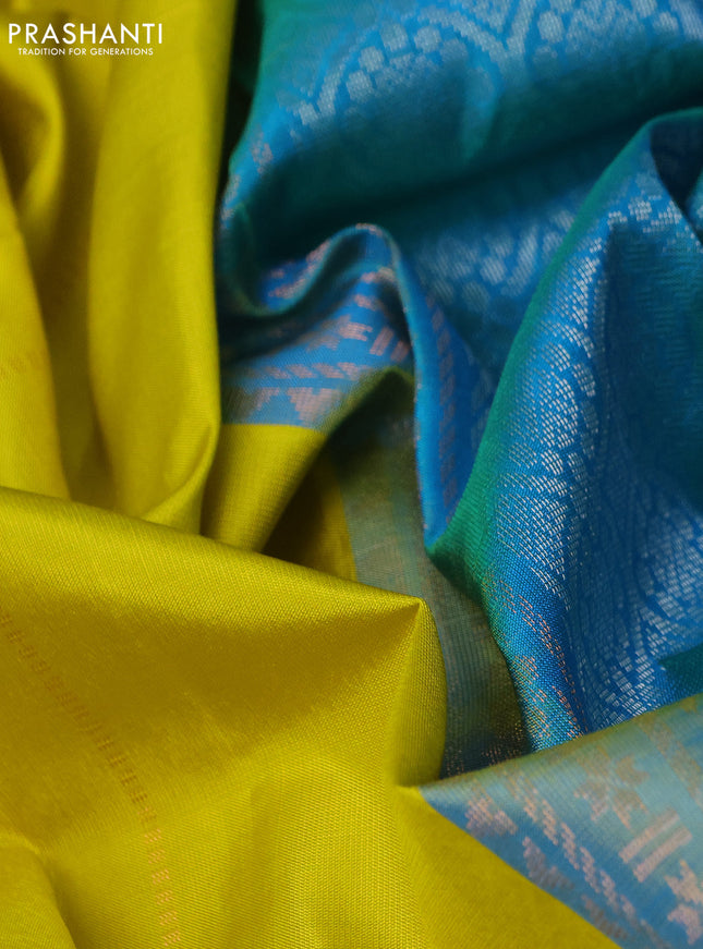 Pure soft silk saree lime yellow and dual shade of teal blue with allover zari weaves & buttas and zari woven butta border
