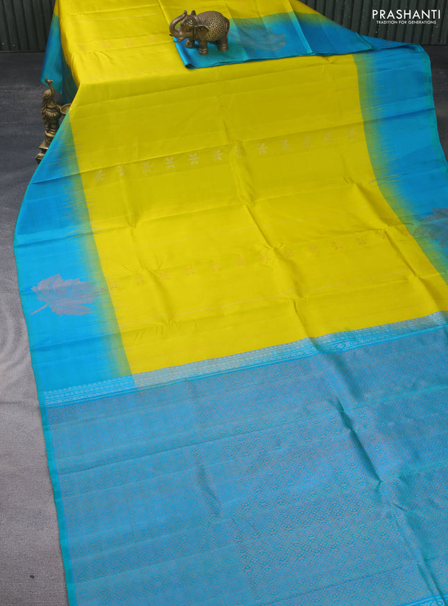 Pure soft silk saree lime yellow and dual shade of teal blue with allover zari weaves & buttas and zari woven butta border
