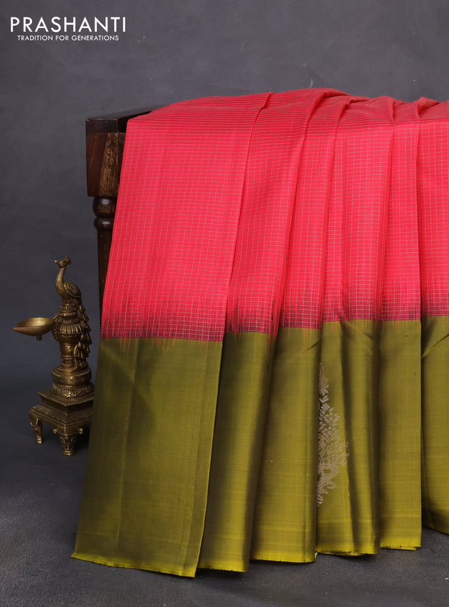 Pure soft silk saree pink and mehendi green with allover zari checked pattern and silver zari woven butta border