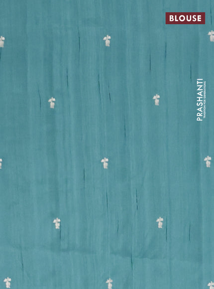 Semi raw silk saree teal blue with embroidery work buttas and floral design embroidery work border