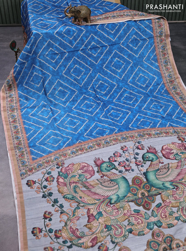 Semi tussar saree cs blue and pastel brown with allover shibori prints and kalamkari pallu & zari border