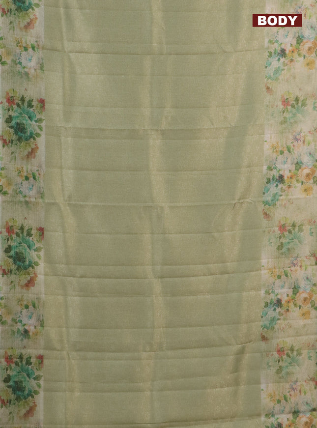 Tissue saree mild pista green with allover zari weaves and floral digital printed border