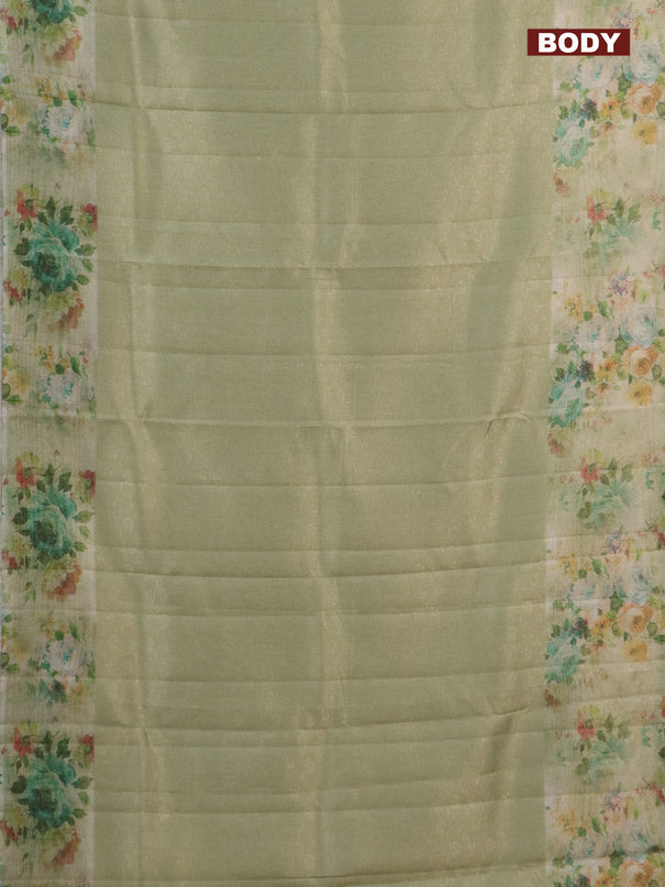 Tissue saree mild pista green with allover zari weaves and floral digital printed border