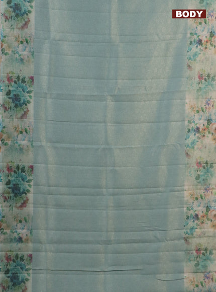 Tissue saree pastel blue with allover zari weaves and floral digital printed border