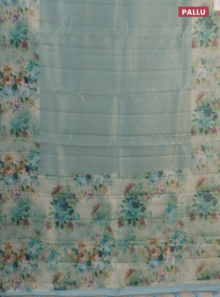 Tissue saree pastel blue with allover zari weaves and floral digital printed border