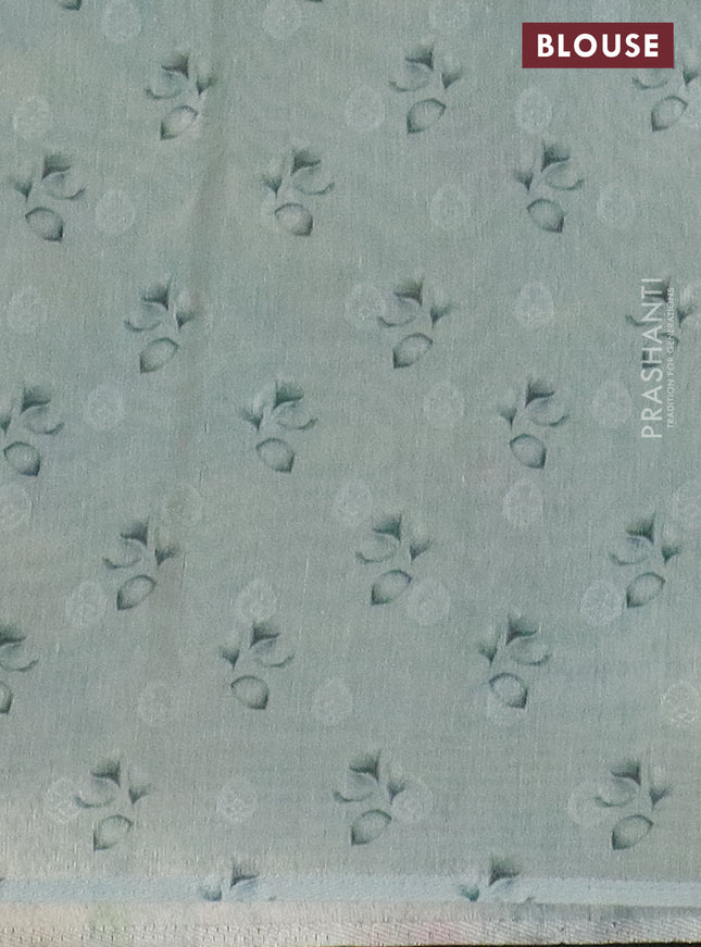 Tissue saree pastel blue with allover zari weaves and floral digital printed border