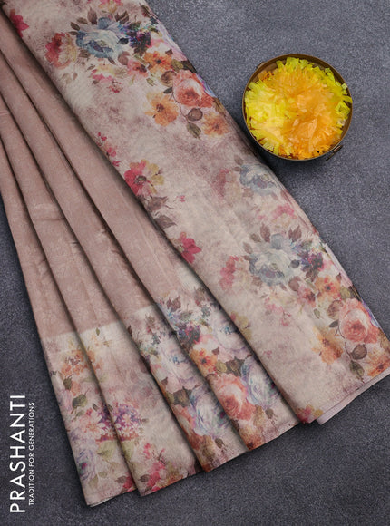 Tissue saree mild peach with allover zari weaves and floral digital printed border