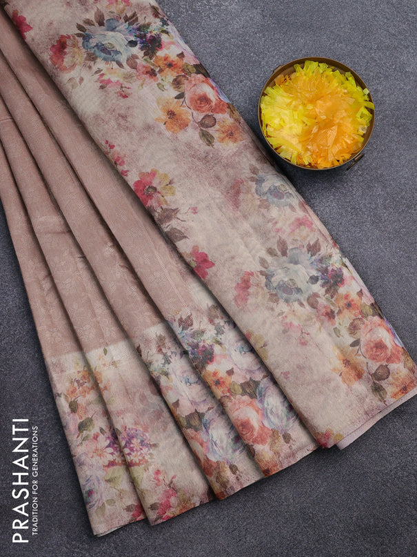 Tissue saree mild peach with allover zari weaves and floral digital printed border