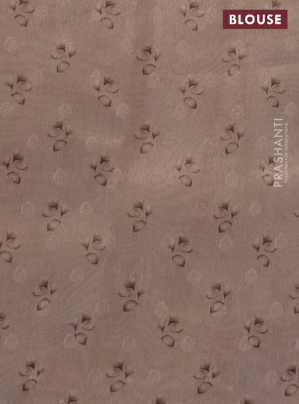 Tissue saree mild peach with allover zari weaves and floral digital printed border